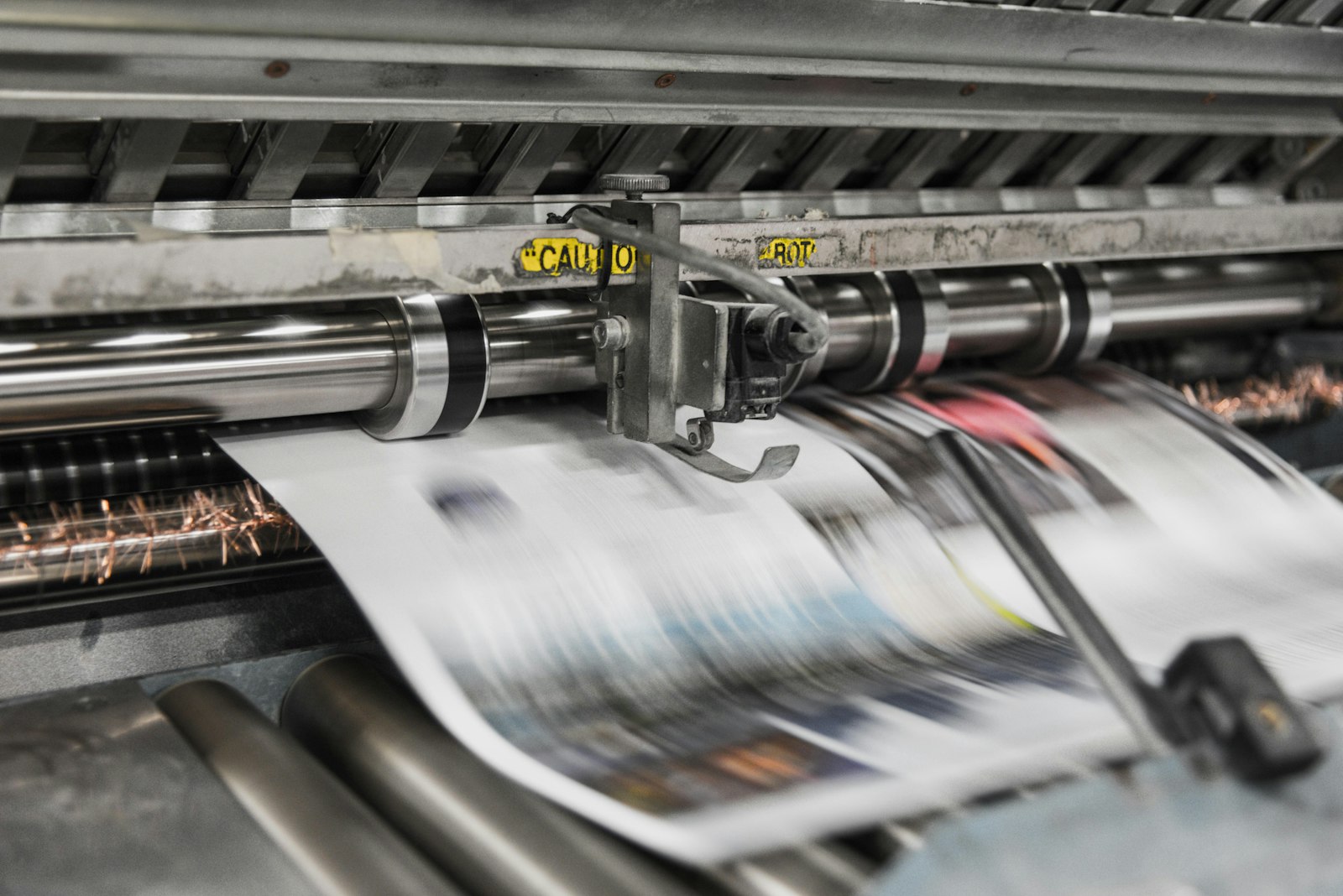 A printing press running